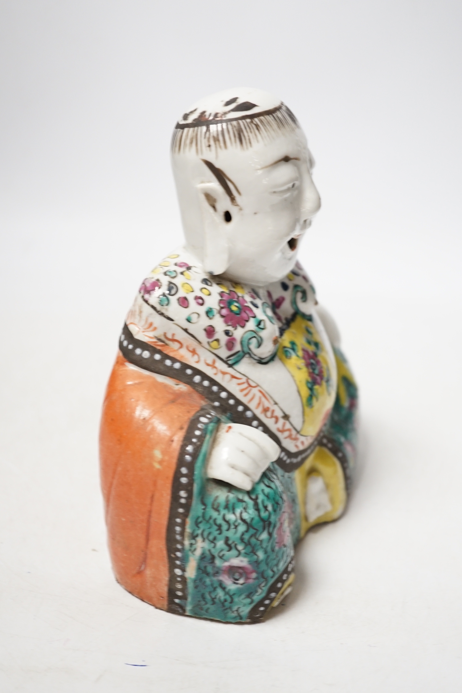 A Chinese enamelled porcelain figure of Budai, late 18th/early 19th century, 18cm high